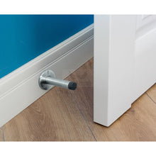 Load image into Gallery viewer, Long adhesive door stop mounted on a skirting board
